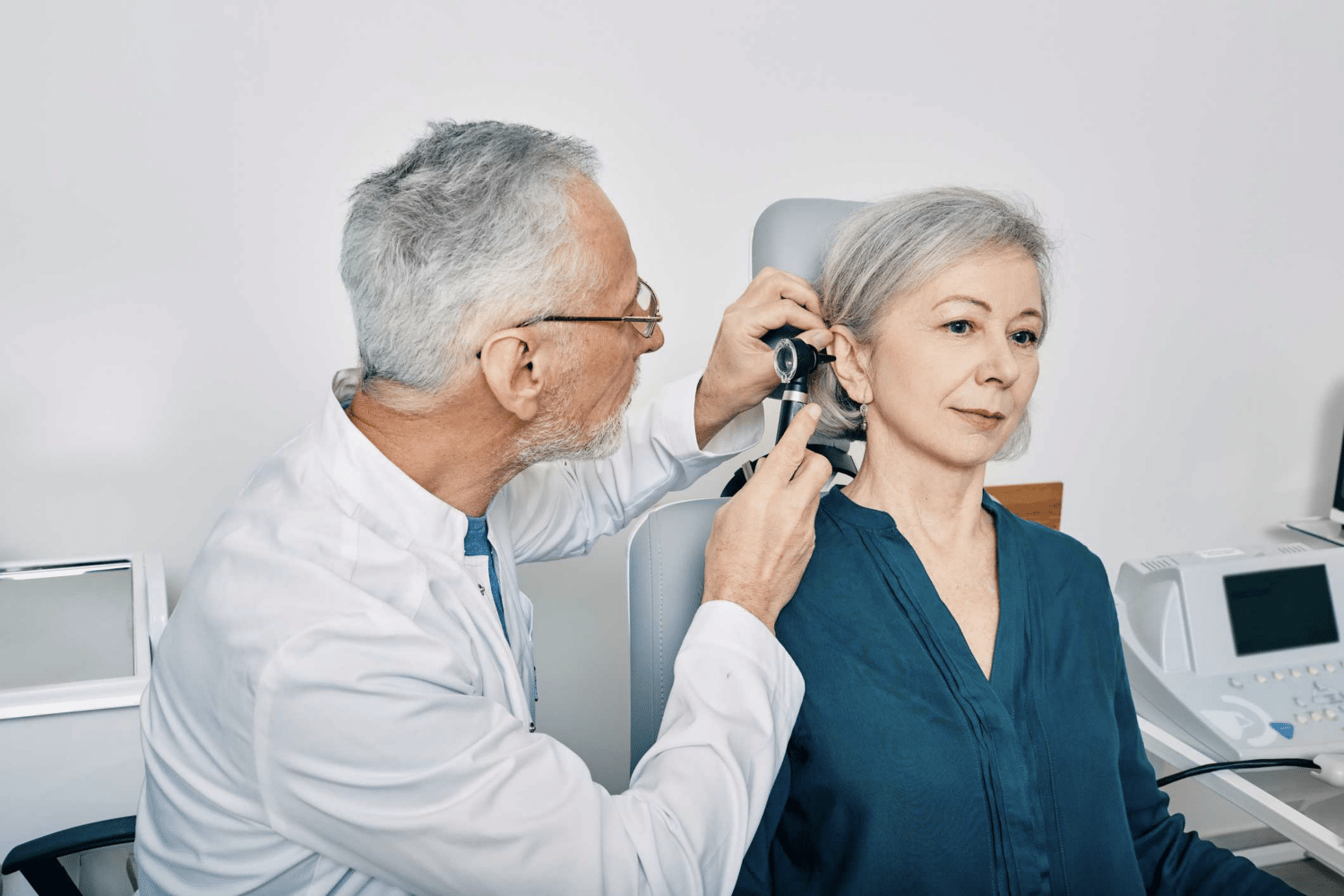 A hearing test being conducted by an audiologist at Darr Hearing in Indiana.